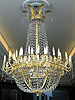 An extremely fine and beautiful Empire gilt bronze and cut-glass thirty six-light chandelier